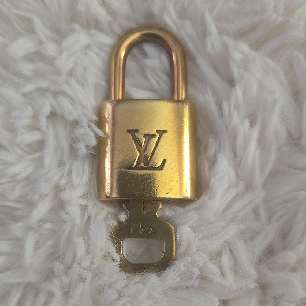 #332 Louis Vuitton Gold Lock with Key